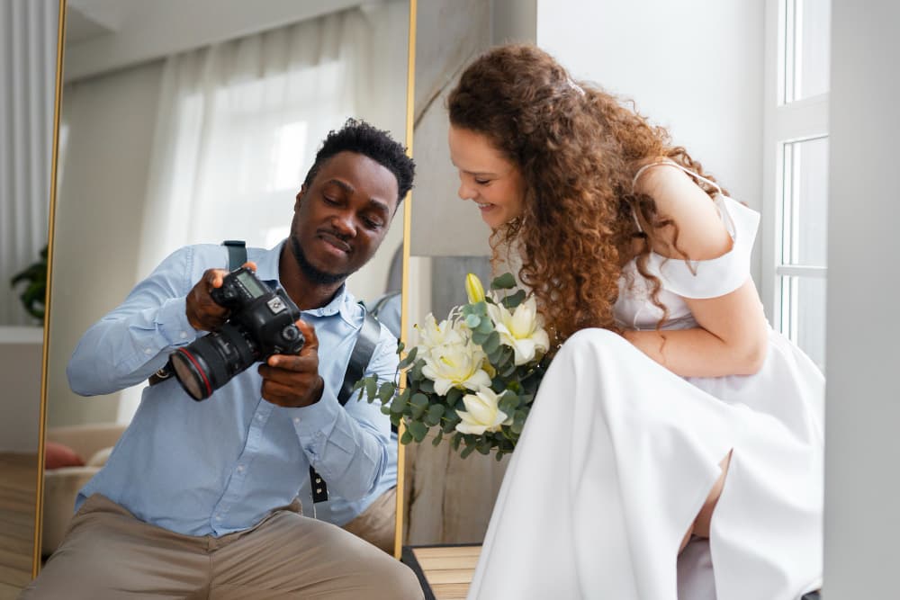 Professional photographer capturing special event moments with camera and lighting equipment
